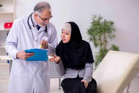 Arab woman visiting experienced doctorの写真素材