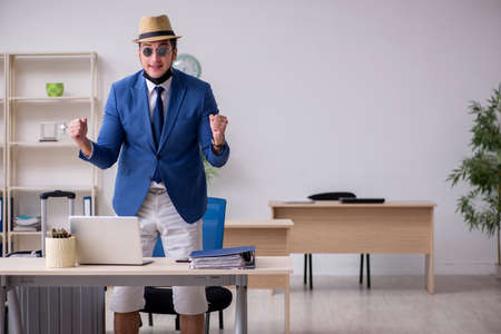 Businessman preparing for trip during pandemicの写真素材