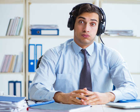 Call center operator talking to customer on live callの写真素材