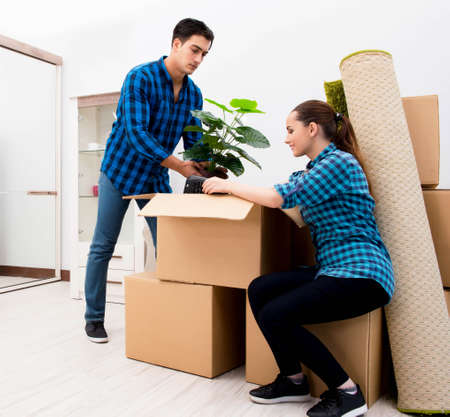 Young family relocating to new house apartment
