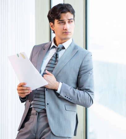 Young successful businessman working at the officeの写真素材