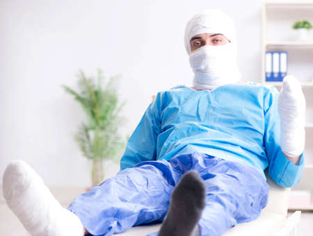 Man suffering from multiple broken bones and fractures
