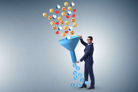 Social network monetization concept with businessmanの写真素材