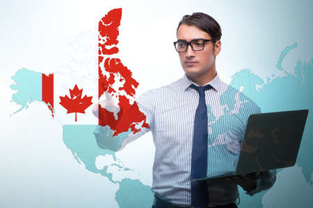 Concept of immigration to Canada with virtual button pressingの写真素材