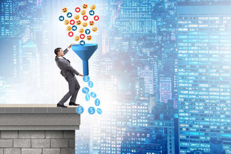 Social network monetization concept with businessmanの写真素材