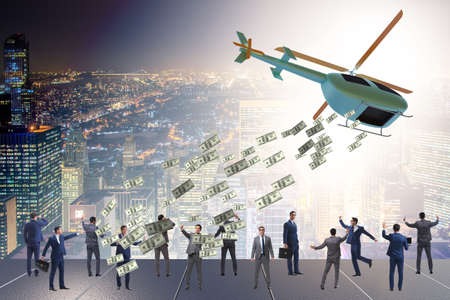 Businessman in helicopter money conceptの写真素材