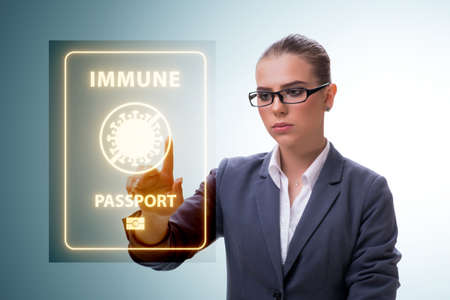 Concept of immunity passport - pressing virtual buttonの写真素材