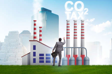 Businessman in carbon tax conceptの写真素材