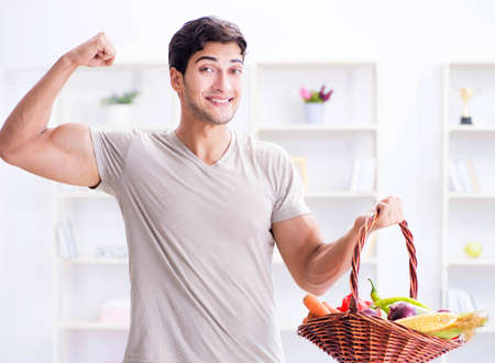 Young man in healthy eating and dieting conceptの写真素材