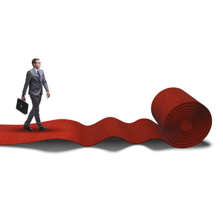 Businessman walking on red carpetの写真素材