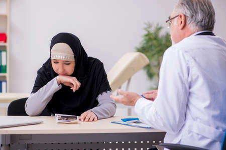 Arab woman visiting experienced doctorの写真素材
