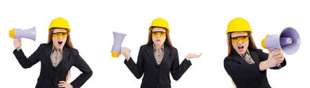Female construction worker with loudspeaker isolated on whiteの写真素材