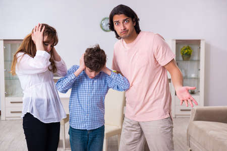 Family conflict with husband and wife and childの写真素材