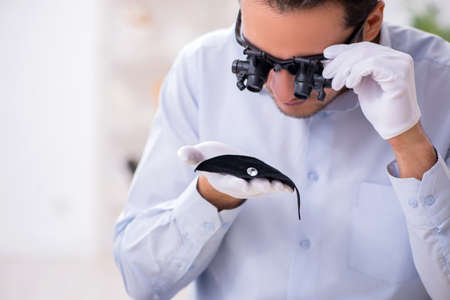 Young male jeweler at the workshop