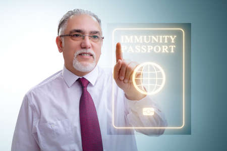 Concept of immunity passport - pressing virtual buttonの写真素材