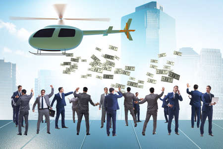 Businessman in helicopter money conceptの写真素材
