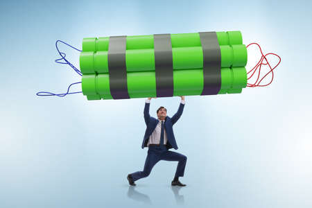 Desperate businessman with dynamite sticks