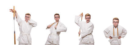 Funny karate fighter with nunchucks on whiteの写真素材