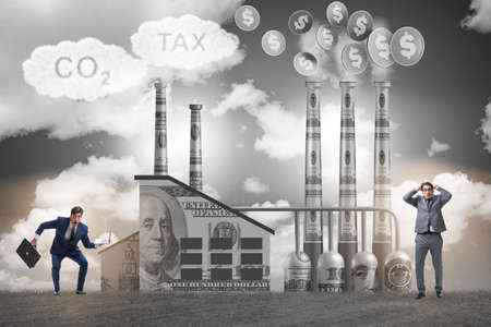 Businessman in carbon tax conceptの写真素材