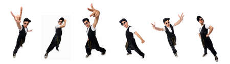 Funny young man dancing isolated on whiteの写真素材