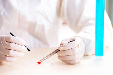 The lab assistant in drug synthesis concept