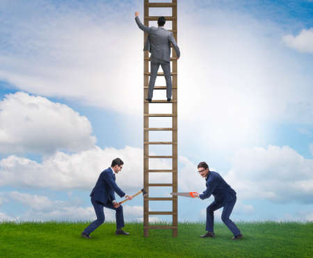 Business unethical competition concept with businessmenの写真素材