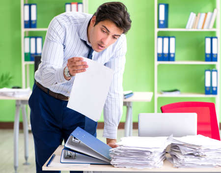 Frustrated businessman stressed from excessive work
