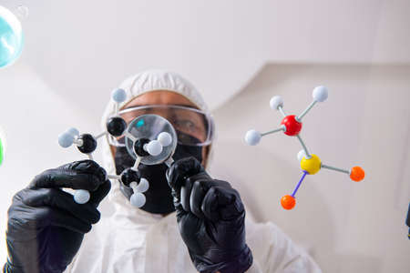 Young male chemist working in the labの写真素材
