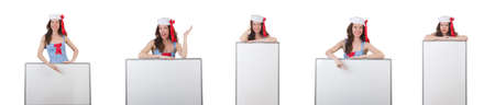 Young woman with blank board on whiteの写真素材