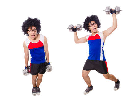 Funny man exercising with dumbbellsの写真素材
