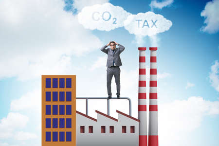 Businessman in carbon tax conceptの写真素材