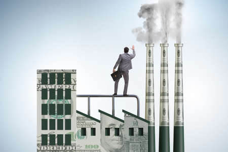 Businessman in the carbon tax conceptの写真素材