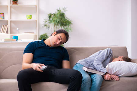 Father and son in exam preparation conceptの写真素材