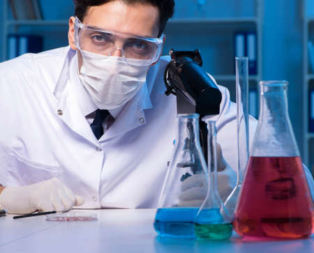 Chemistry assistant working in the chemical lab