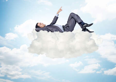 The young male businessman enjoying his time during vacationの写真素材