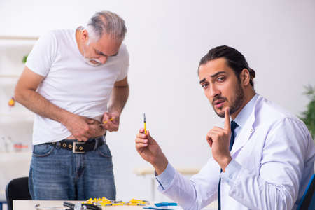 Patient suffering from diabetes visiting doctorの写真素材