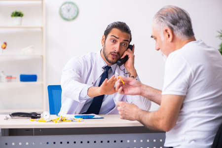 Patient suffering from diabetes visiting doctorの写真素材