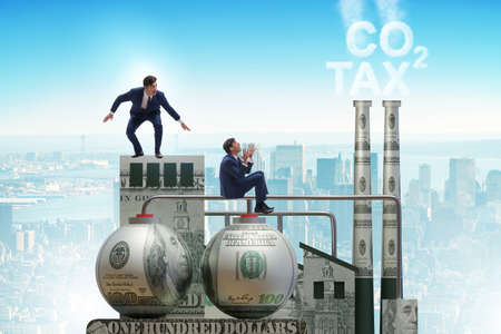 Businessman in carbon tax conceptの写真素材
