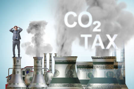 Businessman in carbon tax conceptの写真素材