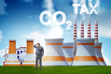 Businessman in carbon tax conceptの写真素材