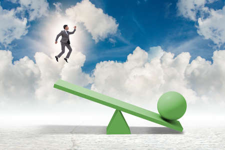 Career progression concept with businessman and seesaw
