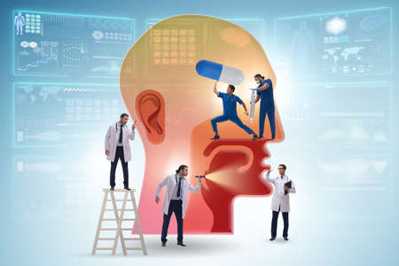 Otolaryngology concept with doctors treating patientの写真素材