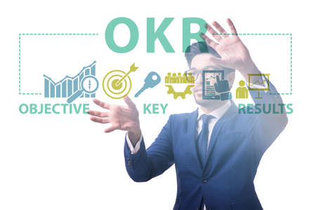 OKR concept with objective key results and businessmanの写真素材