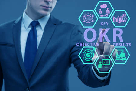 OKR concept with objective key results and businessmanの写真素材