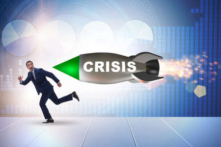 Concept of crisis with businessman chased by rocket