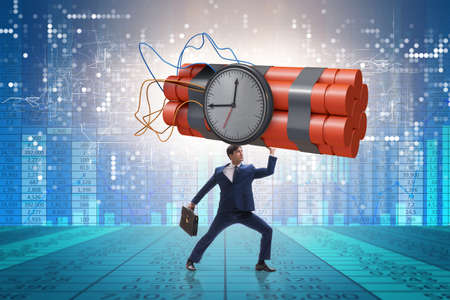 Desperate businessman with dynamite sticks