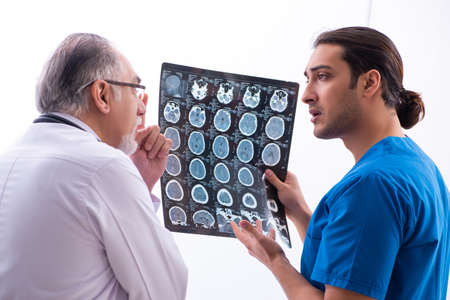Two male doctors working in the clinic