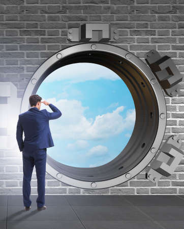 Businessman looking into future with optimismの写真素材