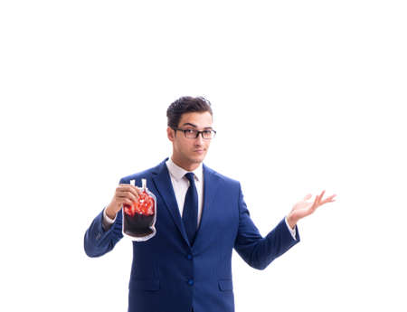 Businessman with blood bag isolated on whiteの写真素材