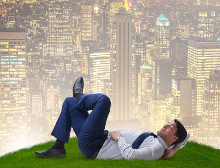 Businessman employee enjoying time off workの写真素材
